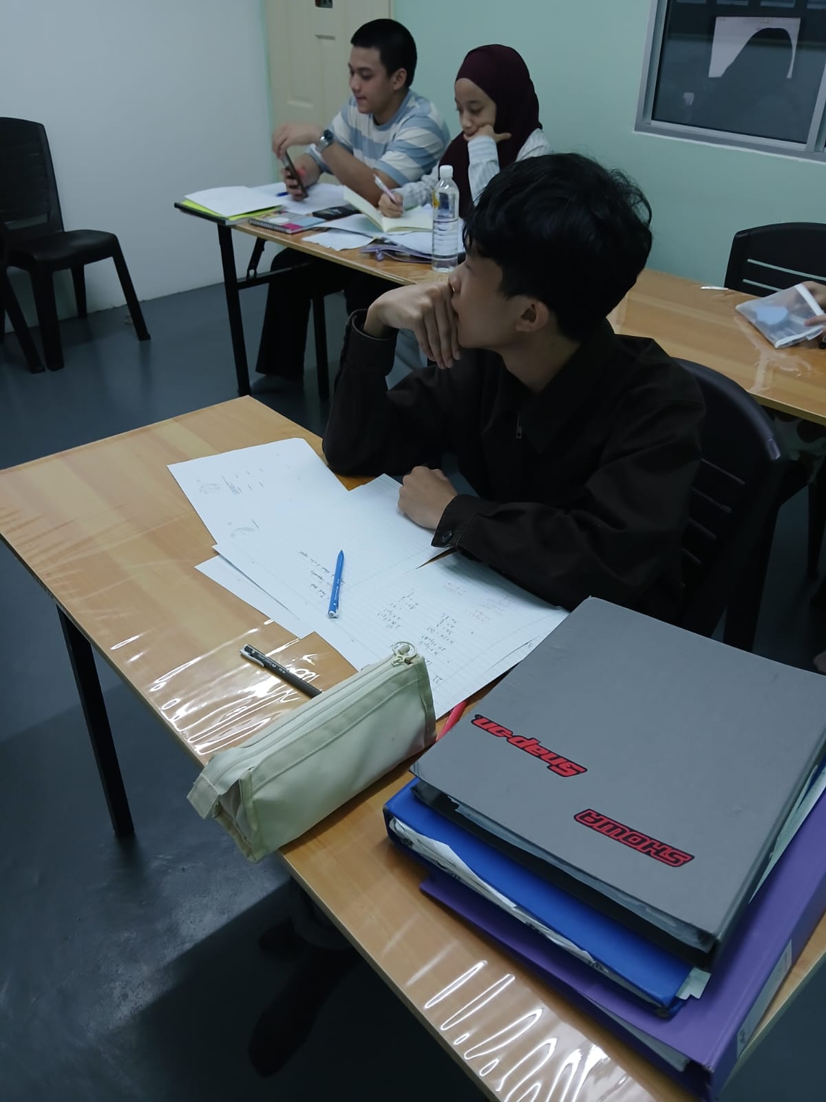 AFTC students concentrating on their classroom exercises