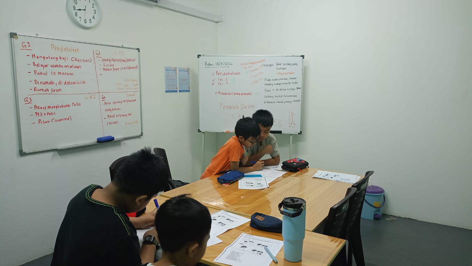 AFTC students reviewing their exercises and working together